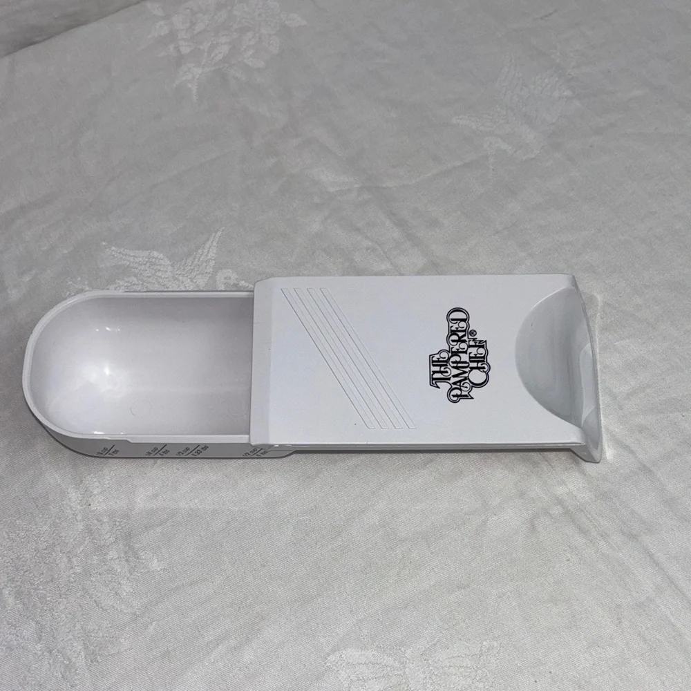 Pampered Chef Adjustable Measuring Cup